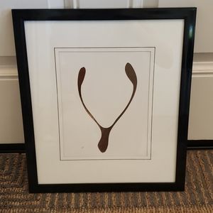 Black frame gold wishbone wall art